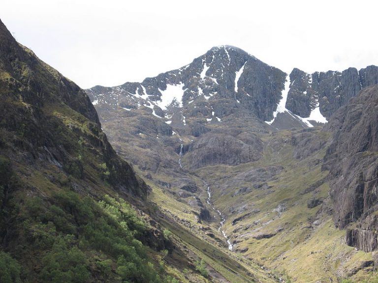 View of Scottish Highlands with glen leading up to mountain
