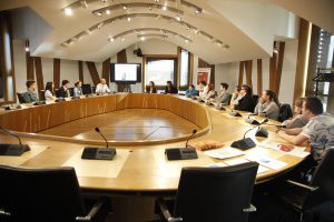 Photo of event participants around the table