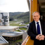 Official portrait of Sir George Reid at the Scottish Parliament