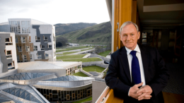 Official portrait of Sir George Reid at the Scottish Parliament