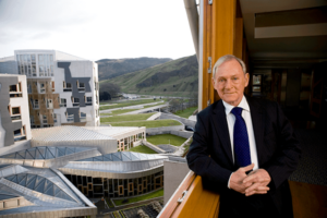 Official portrait of Sir George Reid at the Scottish Parliament